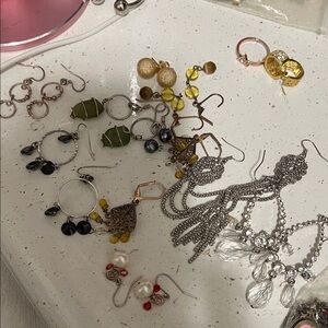 Real  Silver with silver,gold & rose gold color dangling Earrings
Not a bundle.